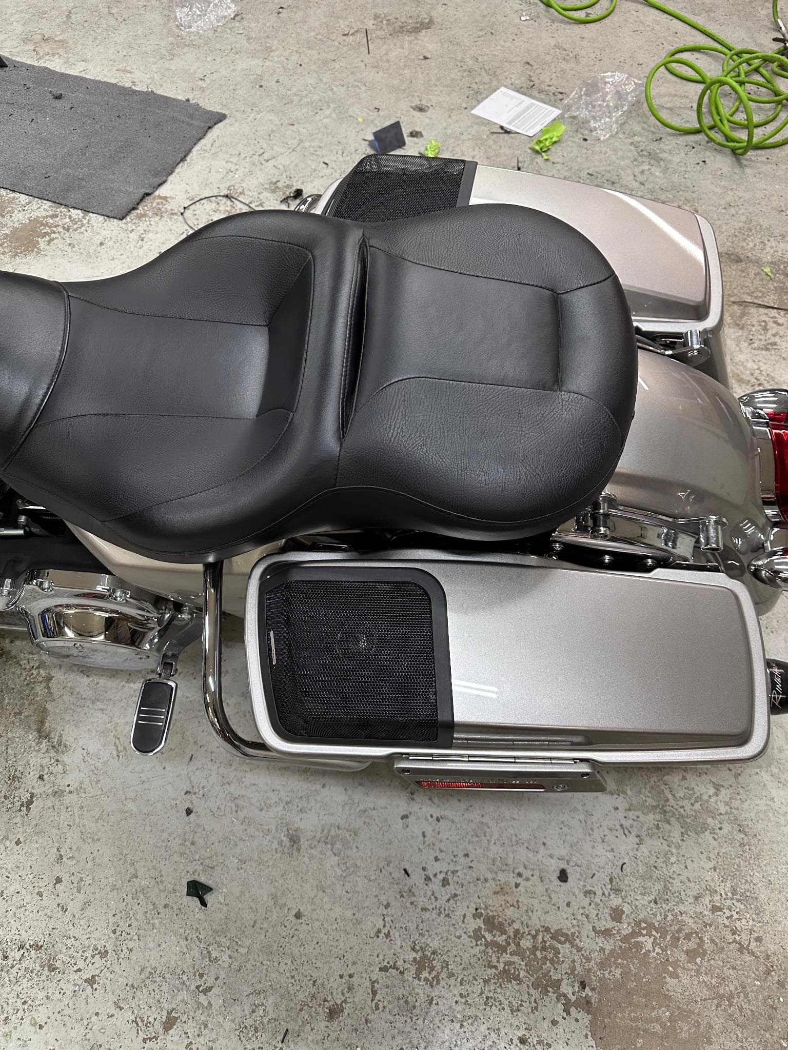 Harley Davidson motorcycle with custom speaker installation in saddlebag
